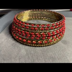 Red and gold costume bracelets